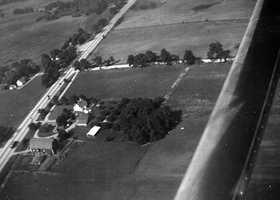 Aerial View of our Farm. I took this picture sometime in the 1940s from the rear cockpit of an open biplane.